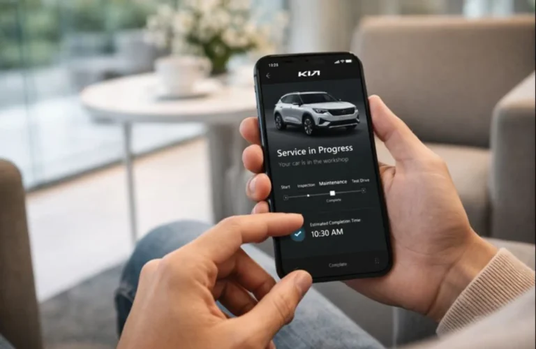 Car owner monitoring real-time vehicle service updates on a smartphone app while waiting in a dealership lounge