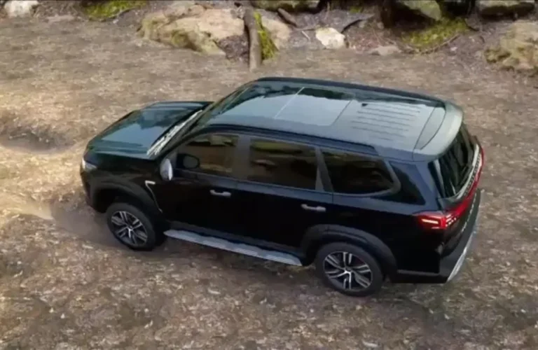 The upcoming black MG Majestor SUV, highlighting its premium design and bold stance on a trail